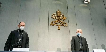 Mons. Filippo Iannone, right, and Mons. Juan Ignacio Arrieta Ochoa de Chinchetru arrive for a press conference to illustrate changes in the Church's Canon law, at the Vatican, Tuesday, June 1, 2021. Pope Francis has changed church law to explicitly criminalize the sexual abuse of adults by priests who abuse their authority and to say that laypeople who hold church office can be sanctioned for similar sex crimes. (AP Photo/Andrew Medichini)
