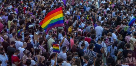 Demonstrators gather during a protest against the killing of Samuel Luiz in the Puerta del Sol in central Madrid, Spain, Monday, July 5, 2021. Authorities in northwestern Spain are asking for time to fully investigate why a 24-year-old man was beaten to death, a crime that has triggered widespread condemnation because friends of the victim claim he was targeted for being gay. LGBTQ activists have called for protests in dozens of cities across Spain later on Monday and members of Spain's left-wing Cabinet have condemned the death of Samuel Luiz in the early hours of Saturday as a hate crime. Police are reviewing surveillance cameras and questioning over a dozen suspects and witnesses who saw how Luiz was beaten to death outside a nightclub in the city of A CoruÃ±a. The death comes amid a spike in attacks on LGBTQ people. (AP Photo/Bernat Armangue)