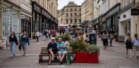 Shoppers walk through the centre of Bath, U.K., on Monday, July 5, 2021. The U.K. is in a race to vaccinate the population against the fast-spreading delta variant quickly enough to be able to lift social-distancing curbs and reopen more businesses on July 19. Photographer: Chris J. Ratcliffe/Bloomberg