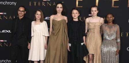 From left, Maddox Jolie-Pitt, Vivienne Jolie-Pitt, Angelina Jolie, Knox Jolie-Pitt, Shiloh Jolie-Pitt, and Zahara Jolie-Pitt arrive at the premiere of 