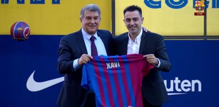 Xavi Hernández y Joan Laporta