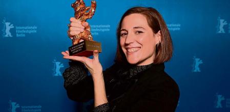 Spanish director and screenwriter Carla Simon poses during a photo call after being awarded the Golden Bear for Best Film award for the film 