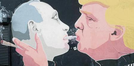 VILNIUS, LITHUANIA - MARCH 17: A mural of U.S. President Donald Trump (R) and Russian President Vladimir Putin 'shotgunning' a marijuana joint is seen on March 17, 2017 in Vilnius, Lithuania. Trump has decreased his tweeting of praise for his Russian counterpart as the former's administration has found itself on the defensive amidst investigations into Russia's meddling in U.S. elections last year. (Photo by Adam Berry/Getty Images)