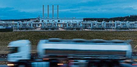 A tanker passes the gas receiving station of the halted Nord Stream 2 project, on the site of a former nuclear power plant, in Lubmin, Germany, on Tuesday, April 5, 2022. Germany is preparing to take a leap into the unknown as Europe starts to get serious about weaning itself off Russian fossil fuels. Photographer: Krisztian Bocsi/Bloomberg