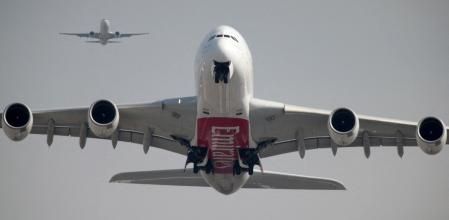 FILE PHOTO: An Emirates Airline Airbus A380-800 plane takes off from Dubai International Airport in Dubai, United Arab Emirates February 15, 2019. REUTERS/Christopher Pike/File Photo