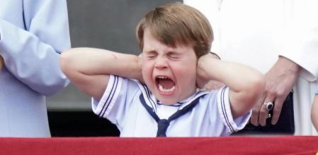 Prince Louis reacts on the balcony of Buckingham Palace, while viewing the Platinum Jubilee flypast, on day one of the Platinum Jubilee celebrations. Picture date: Thursday June 2, 2022. *** Local Caption *** .