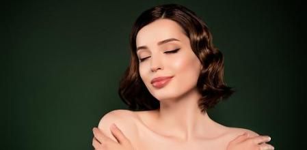 Photo of good mood beautiful attractive female hug embrace herself self-esteem isolated on green color backgroun