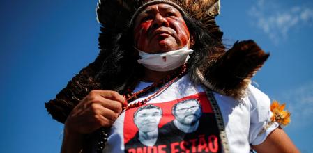 Kamuu Dan Wapichana, from the Wapichana tribe looks on, during a protest against Brazilian President Jair Bolsonaro's government, Brazil's National Indian Foundation (FUNAI)'s President Marcelo Augusto Xavier da Silva and for the search for British journalist Dom Phillips and indigenous expert Bruno Pereira, who went missing while reporting in a remote and lawless part of the Amazon rainforest near the border with Peru, in front of Justice Ministry in Brasilia, Brazil June 14, 2022. REUTERS/Adriano Machado