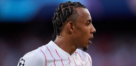 SEVILLE, SPAIN - SEPTEMBER 14: Jules Kounde of Sevilla FC looks on during the UEFA Champions League group G match between Sevilla FC and RB Salzburg at Estadio Ramon Sanchez Pizjuan on September 14, 2021 in Seville, Spain. (Photo by Fran Santiago/Getty Images)