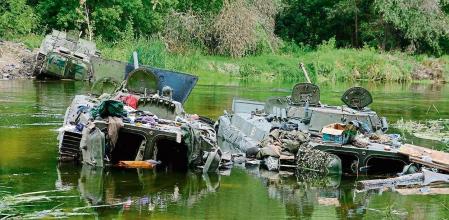This handout photograph taken on September 9, 2022 and released by the press-service of the Commander-in-Chief of the Ukrainian Armed Forces on September 11, 2022, shows abandoned Russian military equipment during the Ukarinian Army counter-offensive in Kharkiv region, amid the Russian military invasion of Ukraine. - Ukraine said on September 10, 2022, that its forces had recaptured more than 3,000 square kilometres (1,158 square miles) this month from Russian troops in a counter-offensive centred on the country's northeast. (Photo by HANDOUT / General Staff of the Ukrainian Armed Forces / AFP) / RESTRICTED TO EDITORIAL USE - MANDATORY CREDIT 