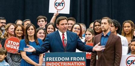 FILE - Florida Gov. Ron DeSantis addresses the crowd before publicly signing HB7, 