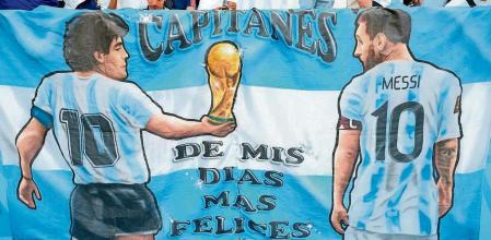 22 November 2022, Qatar, Lusail: An Argentina banner depicting Diego Maradona and Lionel Messi during the FIFA World Cup Qatar 2022 Group C soccer match between Argentina and Saudi Arabia at the Lusail Stadium. Photo: Nick Potts/PA Wire/dpa 22/11/2022 ONLY FOR USE IN SPAIN