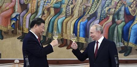 FILE - Russian President Vladimir Putin, right, and Chinese President Xi Jinping toast during their dinner at The Palace of the Facets, a building in the Moscow Kremlin, Russia, March 21, 2023. China’s leader Xi just concluded his three-day visit with Russian President Putin, a warm affair in which the two men praised each other and spoke of a profound friendship. It’s a high in a complicated, centuries-long relationship in which the two countries have been allies and enemies. (Pavel Byrkin, Sputnik, Kremlin Pool Photo via AP, File)