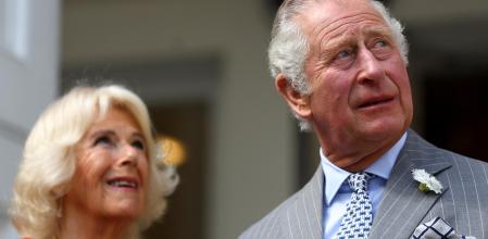 Prince Charles of Wales and Camilla Duchess of Cornwall are greeted by children as they arrive for their visit to Canada House in London, ahead of their forthcoming tour.