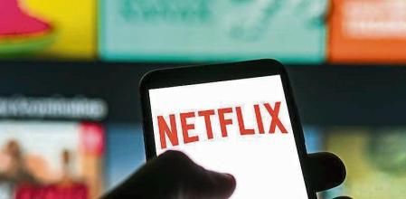 POLAND - 2022/12/02: In this photo illustration a Netflix logo seen displayed on a smartphone. (Photo Illustration by Mateusz Slodkowski/SOPA Images/LightRocket via Getty Images)