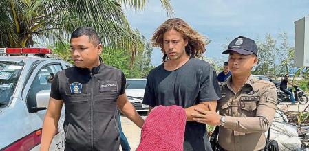 Daniel Sancho Bronchalo, the son of Spanish actor Rodolfo Sancho Aguirre is escorted while assisting Thai police with investigations after he was arrested on charges of murder in the death and dismemberment of his Colombian travelling companion Edwin Arrieta Arteaga on the tourist island of Koh Phangan, Thailand August 7, 2023. REUTERS/Stringer NO RESALES. NO ARCHIVES