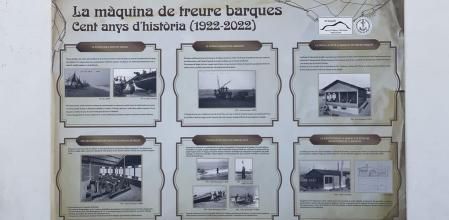 Panel informativo de la 'màquina de treure barques'.