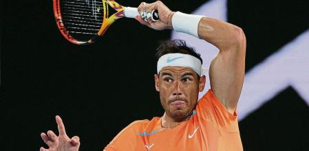 FILE PHOTO: Tennis - Australian Open - Melbourne Park, Melbourne, Australia - January 18, 2023 Spain's Rafael Nadal in action during his second round match against Mackenzie Mcdonald of the U.S. REUTERS/Loren Elliott/File Photo