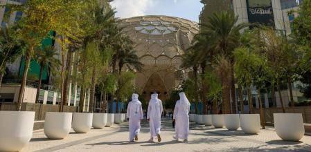 Attendees walk through the campus in the Blue Zone ahead of the COP28 climate conference at Expo City in Dubai, United Arab Emirates, on Wednesday, Nov. 29, 2023. More than 70,000 politicians, diplomats, campaigners, financiers and business leaders willflyto Dubaito talk about arresting the world#{emoji}146;s slide toward environmental catastrophe. Photographer: Hollie Adams/Bloomberg