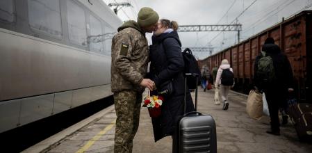 Ukrainian serviceman Vyacheslav greets his wife Viktoria who is visiting him during a short break from his frontline duty, as the country is preparing to mark Christmas, amid Russiaâ#{emoji}128;#{emoji}153;s attack on Ukraine, at the train station in Kramatorsk, Ukraine December 22, 2023. REUTERS/Thomas Peter TPX IMAGES OF THE DAY