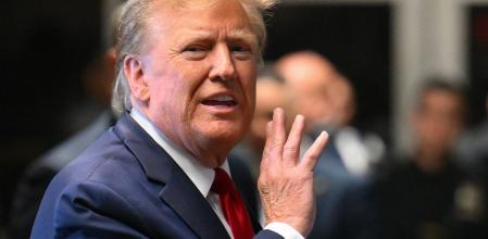 Former US President Donald Trump speaks to the press at Manhattan Criminal Court after a hearing in his case of paying hush money to cover up extramarital affairs in New York City on February 15, 2024. Trump will become the first former US president to face criminal trial when jury selection begins in New York on March 25 in his case of allegedly covering up hush money payments. 
