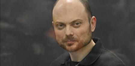 FILE - Russian opposition activist Vladimir Kara-Murza stands in a glass cage in a courtroom during announcement of the verdict on appeal at the Moscow City Court in Moscow, Russia, July 31, 2023. The prominent opposition figure survived what he believes were attempts to poison him in 2015 and 2017. He nearly died from kidney failure in the first instance and suspects poisoning but no cause was determined. He was hospitalized with a similar illness in 2017 and put into a medically induced coma. His wife said doctors confirmed he was poisoned. (AP Photo/Dmitry Serebryakov, File)