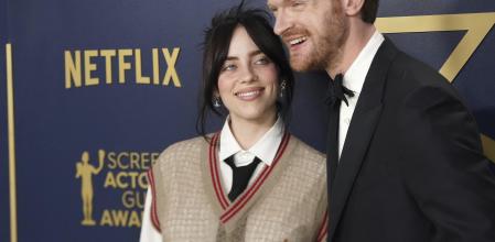 Billie Eilish, left, and Finneas arrive at the 30th annual Screen Actors Guild Awards on Saturday, Feb. 24, 2024, at the Shrine Auditorium in Los Angeles. (Photo by Jordan Strauss/Invision/AP)