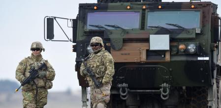 (FILES) US soldiers patrol prior to an artillery live fire event by the US Army Europe's 41st Field Artillery Brigade at the military training area in Grafenwoehr, southern Germany, on March 4, 2020. Two German-Russian nationals have been arrested in Bavaria on suspicion of spying for Russia and planning acts of sabotage to undermine military support for Ukraine, German federal prosecutors said on April 18, 2024. The two men, identified only as Dieter S. and Alexander J., were arrested in the city of Bayreuth prosecutors said. They are accused of scouting potential targets for attacks, 