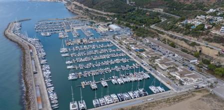 PORT GINESTA sorra que s'acumula al voltant del port i a la bocana d'entrada