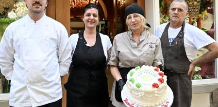 Bari (Italy), 12/06/2024.- Angelo Arbore, Elena Lezzi, Lucia Arbore and Cataldo Arbore, owners and staff of the Isa pastry shop, pose for a picture with a cake prepared to welcome the participants of the Group of Seven (G7) summit to Puglia, in Bari, southern Italy, 12 June 2024. The G7 summit will bring together the Group of Seven member states leaders in Borgo Egnazia resort in southern Italy from 13 to 15 June 2024. (Italia) EFE/EPA/DONATO FASANO