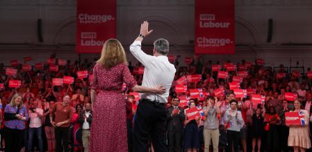 British opposition Labour Party leader Keir Starmer is accompanied by Victoria Starmer on stage, during a general election campaign event at The Royal Horticultural Halls in London, Britain, June 29, 2024. REUTERS/Suzanne Plunkett