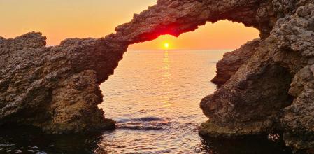Disfrutando del amanecer en la playa del Portitxol.