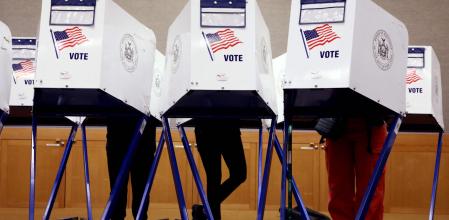 TOPSHOT - Voters fill out their ballots at a polling station in New York City on Election Day, November 5, 2024. (Photo by Leonardo Munoz / AFP)
