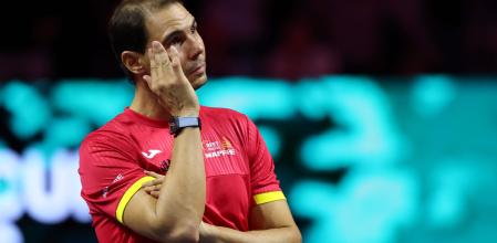 TOPSHOT - Spain's Rafael Nadal cries as he attends a tribute to his career at the end of the quarter-final doubles match between Netherlands and Spain during the Davis Cup Finals at the Palacio de Deportes Jose Maria Martin Carpena arena in Malaga, southern Spain, on November 19, 2024. Superstar Rafael Nadal's glittering career in professional tennis came to an end on November 19, 2024 as Netherlands eliminated Spain in the Davis Cup quarter-finals. (Photo by Thomas COEX / AFP)