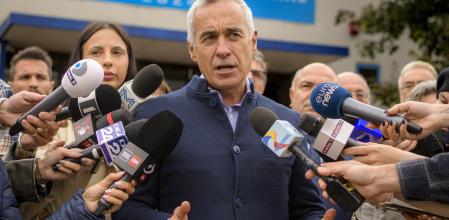 Calin Georgescu, running as an independent candidate for president, speaks to media after registering his bid in the country's presidential elections, in Bucharest, Romania, Tuesday, Oct. 1, 2024. (AP Photo/Alexandru Dobre)