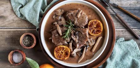 Solomillo de cerdo con setas y mandarinas