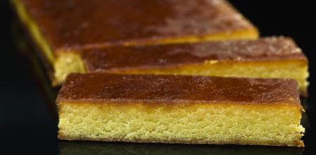 Bar of Christmas Toasted Egg Yolk Nougat on black background (turron de yema tostada)  (this picture has been taken with a Hasselblad H3D II 31 megapixels camera)