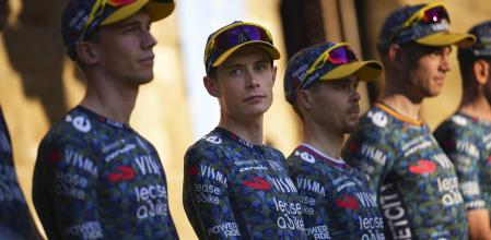 Denmark's Jonas Vingegaard, center, and his Visma-Lease a Bike teammates line up during the team presentation in Florence, Italy, Thursday, June 27, 2024, two days before the start of the Tour de France cycling race. (AP Photo/Daniel Cole)
