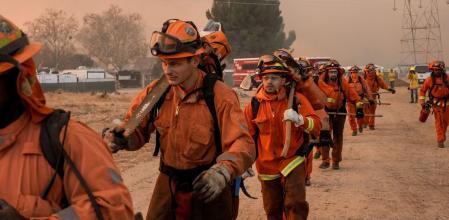 A crew of inmate firefighters begins to work on containment during the Hughes Fire in Castaic, California, US, on Wednesday, Jan. 22, 2025. The Hughes Fire is spreading rapidly north of Los Angeles, spurring evacuation orders around Castaic Lake and threatening one of California's main transportation arteries. Photographer: Kyle Grillot/Bloomberg