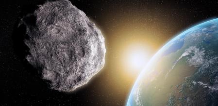 Representación de un asteroide durante un paso cercano, como el que podría llevar al objeto 2024 YR4 a chocar contra la Tierra el 22 de diciembre de 2032
