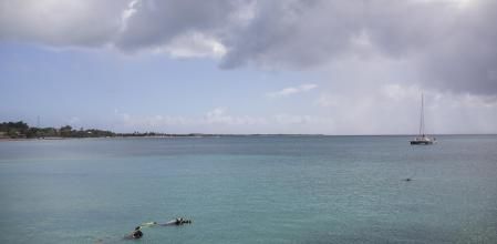 People snorkel in the water in Saint Croix, Virgin Islands, U.S., on Sunday, March 28, 2021. Across the Caribbean, the impact of COVID-19 on the travel and tourism industry has been very apparent, the Caribbean Tourism Organization (CTO) said in a report. 2020 saw a 65.5 percent drop in tourist arrivals to the Caribbean. Photographer: Ivan Valencia/Bloomberg