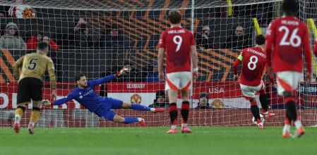 Bruno Fernandes shoots from the penalty spot to score the team's second goal during the UEFA Europa League Last 16 Second Leg football match between Manchester United and Real Sociedad at Old Trafford stadium in Manchester