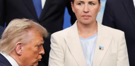 US President Donald Trump (L) and Danish Prime Minister Mette Frederiksen gather for a family photo before a plenary session of the North Atlantic Treaty Organization (NATO) Heads of State and Government summit in The Hague, on June 25, 2025. NATO leaders hold a two-day summit on June 24 and 25 in The Hague. (Photo by Christian Hartmann / POOL / AFP) / Netherlands OUT