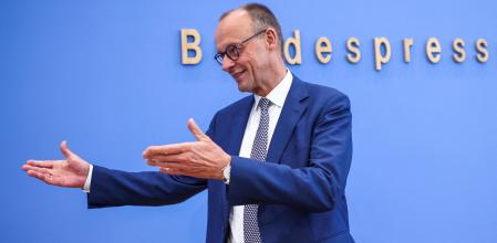 German Chancellor Friedrich Merz gestures as he attends a press conference about domestic and foreign policy issues at the House of the 'Bundespressekonferenz' in Berlin, Germany July 18, 2025. REUTERS/Liesa Johannssen