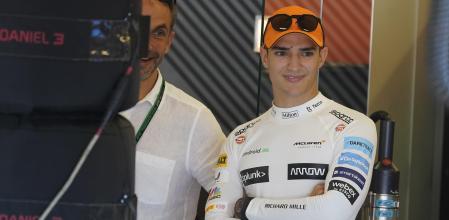 FILE - McLaren test driver Alex Palou, of Spain, waits in the garage before the first practice session for the Formula One U.S. Grand Prix auto race at Circuit of the Americas, Friday, Oct. 21, 2022, in Austin, Texas. IndyCar driver Alex Palou will be the reserve driver next season for McLaren in Formula One, the first step in his 2024 move from Chip Ganassi Racing to McLaren in either IndyCar or F1. (AP Photo/Darron Cummings, File)