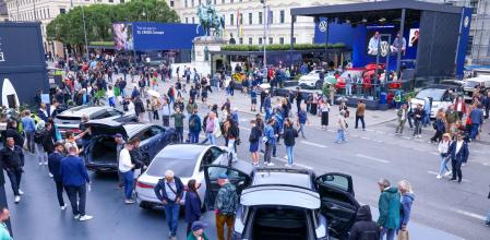 Attendees visit the BYD Co. and Volkswagen AG stand at the Open Space on the opening day of the IAA Mobility 2025 expo in Munich, Germany, on Tuesday, Sept. 9, 2025. The Munich car show is taking place as trade tensions linger with Beijing following the European Unions decision last year to impose tariffs on EVs imported from China. Photographer: Alex Kraus/Bloomberg
