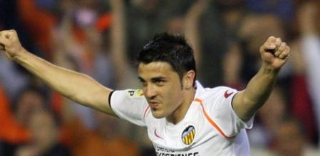 David Villa celebra un gol marcado ante el Real Madrid