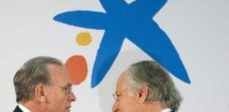 El presidente y vicepresidente de Criteria CaixaCorp, Isidre Fainé y Juan Maria Nin, en el inicio de la junta general ordinaria para modificar sus estatutos y convertirse en CaixaBank.