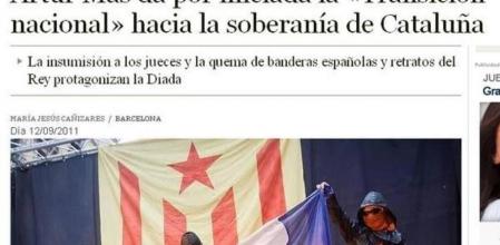 Imagen de la noticia de ABC en su edición on line que informa de los actos institucionales de la Diada con la foto de los encapuchados quemando banderas de España y Francia