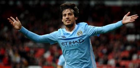 David Silva celebra uno de los goles del City ante el United